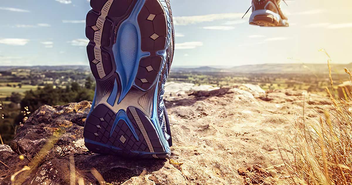 Shoes running across a landscape.